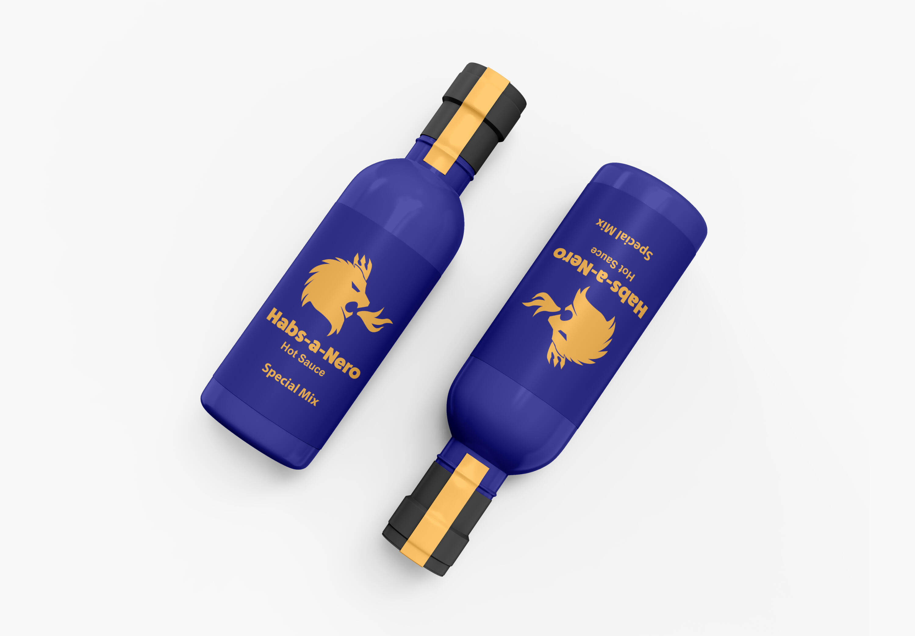 Two dark blue bottles of "Habs-a-Nero Hot Sauce Special Mix" angled diagonally on a white background. Each bottle has a gold logo of a dragon head, gold lettering, a black cap with a gold band, and the label is oriented differently on each bottle.